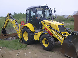 экскаватор-погрузчик New-holland
